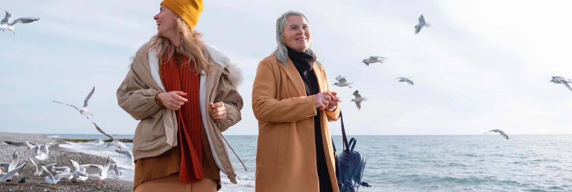 Friends walking on the beach